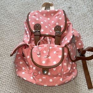 Candie’s dust coral polka dot rucksack style canvas backpack
